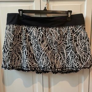Lululemon pace setter Womens size 12 tennis skirt .
